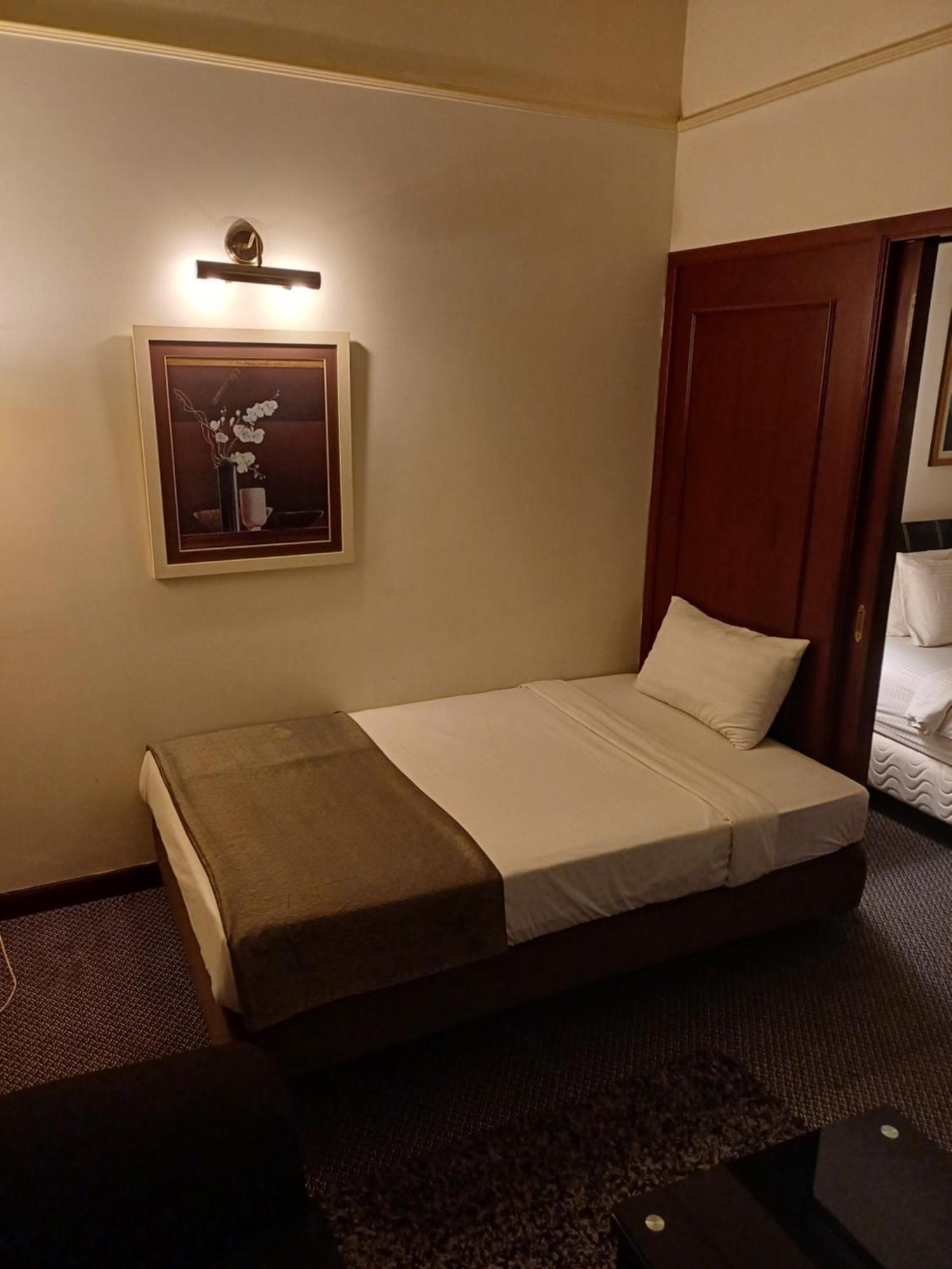 Times Square Grand Service Suite كوالالمبور الغرفة الصورة